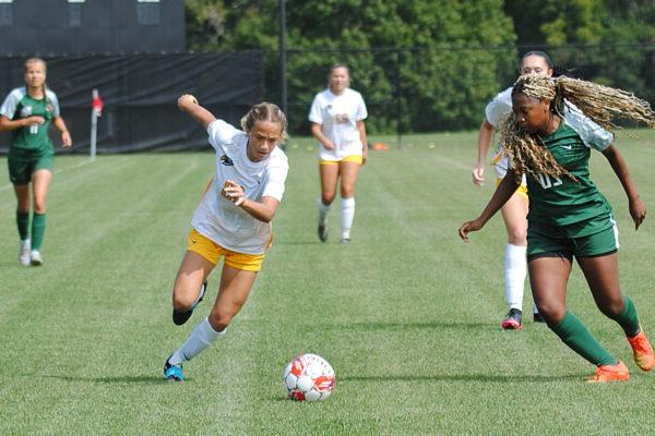 Women's Soccer players on the field